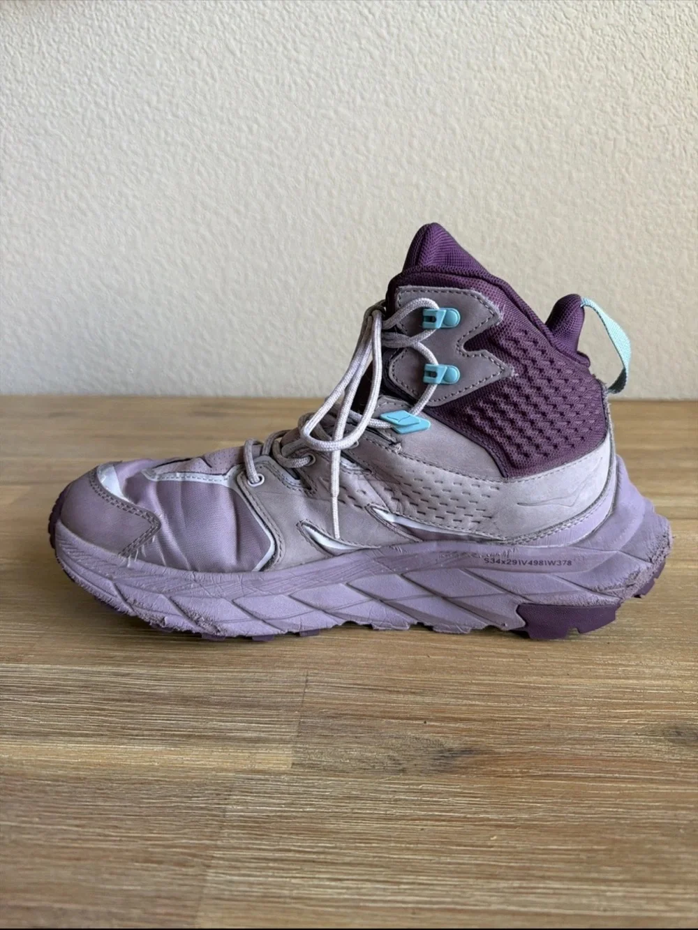 Hoka Lavender and Deep Purple High-Top Trail Sneakers